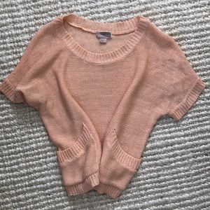 Peach shortsleeved knit top with pockets